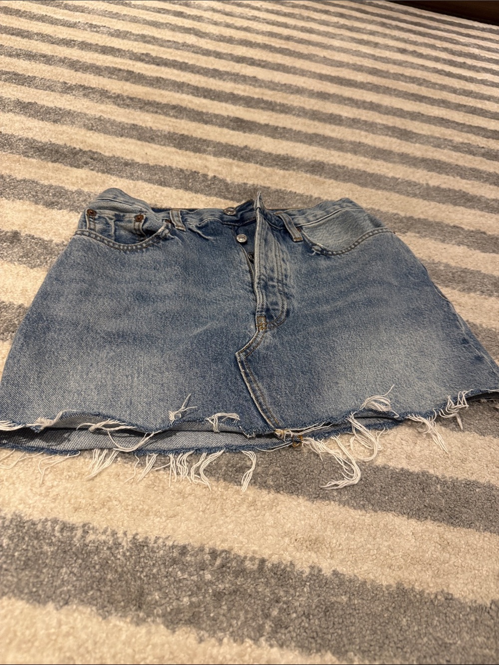 Re/Done Distressed Light Blue Denim Mini Skirt